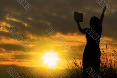 female praying with bible #2