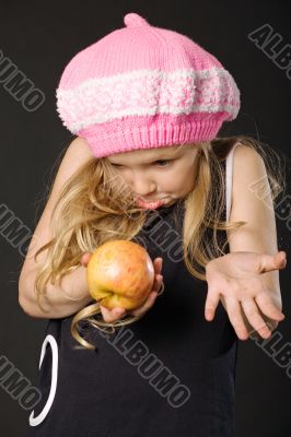 surprised girl with apple