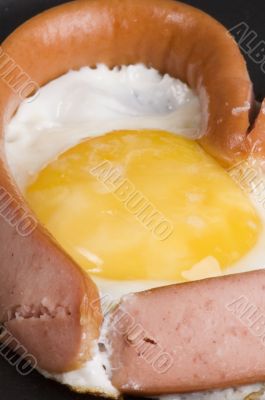 fried eggs with sausage