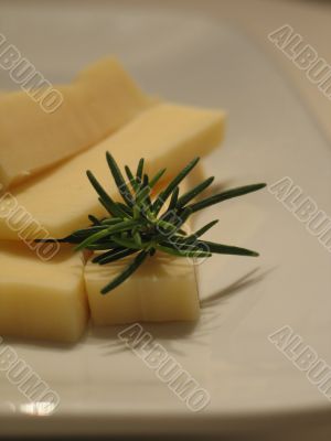 cheese and herbs on a dish