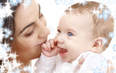 smiling baby in mother hands