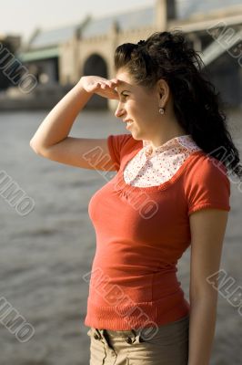 woman looking at river water