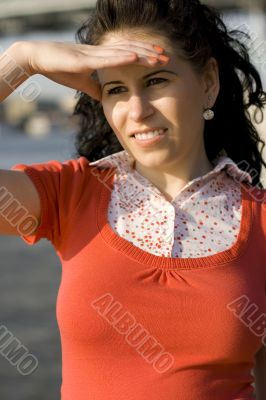 woman looking at river water