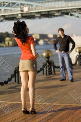 couple staying opossite