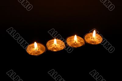 Four bright candles