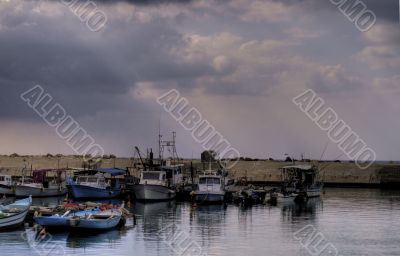 Fishing ships in a harbor