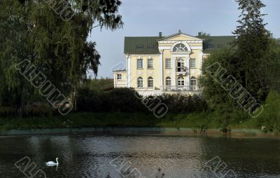 Big house beside pond