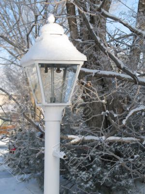 white outdoor light with snow