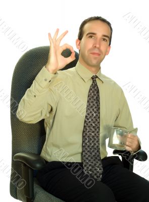 Businessman Sitting With Coffee