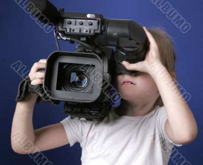 little girl and big camera