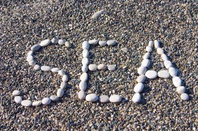 word sea made of white stones