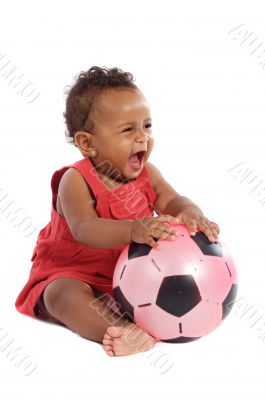 Happy baby with soccer ball
