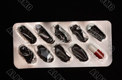 Silver package of pills spent
