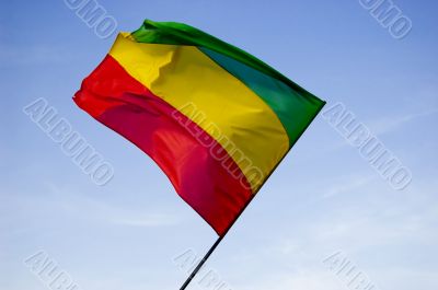 reggae flag over blue sky