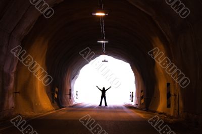 silhouette in tunnel