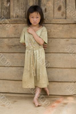 Girl of Laos in dirty clothes