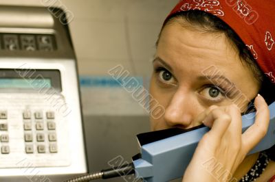 girl having a call on a telephone