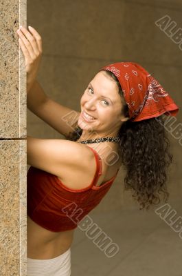 pretty brunette near column