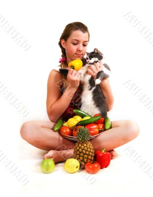 Girl with fruit and a cat