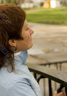 redhead woman on the bridge