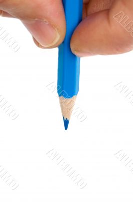 Hand with blue pen on a white background
