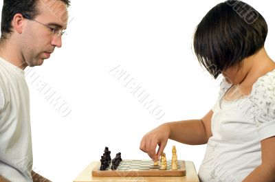 Father Daughter Playing Chess
