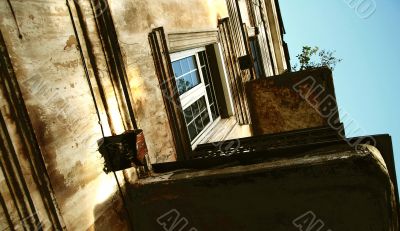 Burnt ancient building with balconies