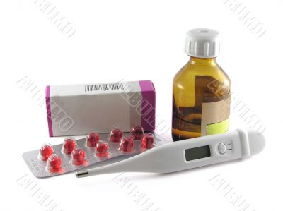 Medicine and digital thermometer usolated