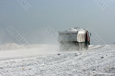 track carries white material of processing