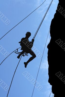 man-climber rises on the wall