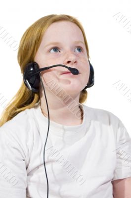 little girl wearing headset