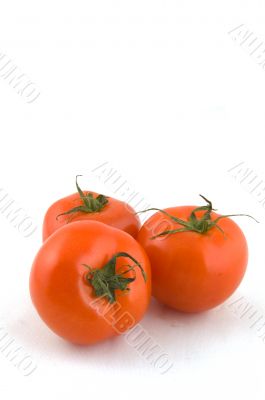 fresh tomatoes isolated on white background