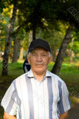 elderly man in a cap