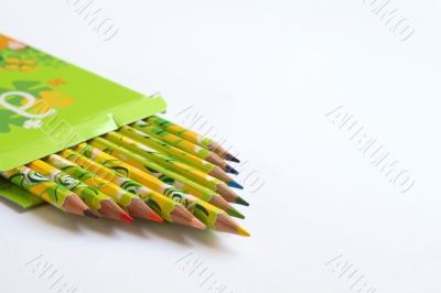 crayons in green box