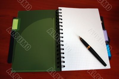 Notebook with pen