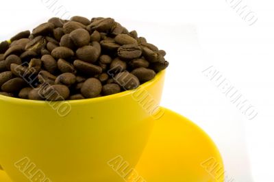 yellow cup with beans