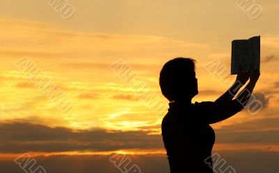female praying with bible #2