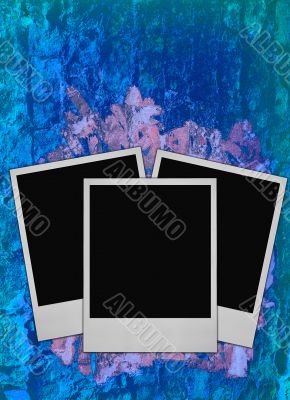 photo frames on blue rough background