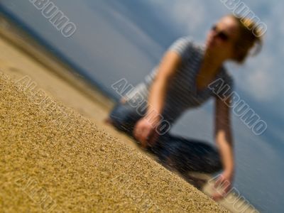 Girl on windy beach