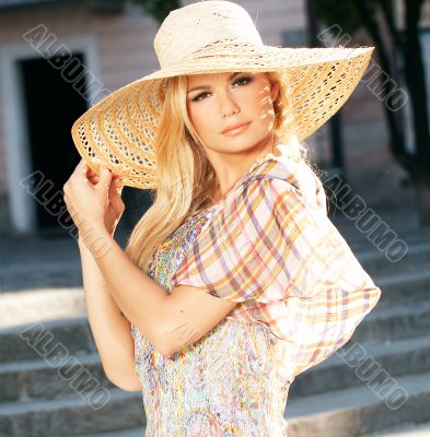 Blond Woman Wearing Sun Hat