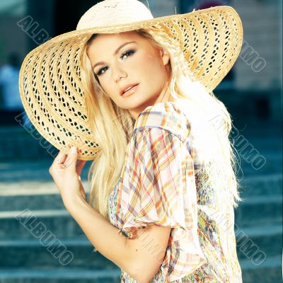 Blond Woman Wearing Sun Hat