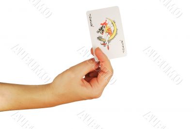  womanish hand holds a playing cards