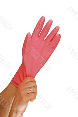  womanish hand is in a pink glove