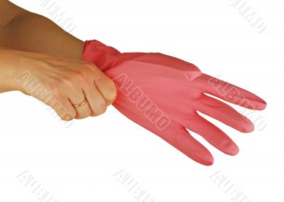  womanish hand is in a pink glove