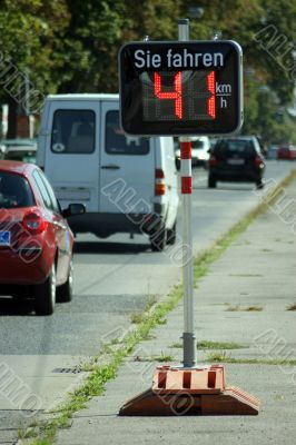 Speed control on a road