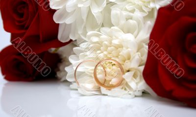 wedding rings and flowers