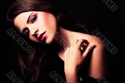 brunette girl posing in studio