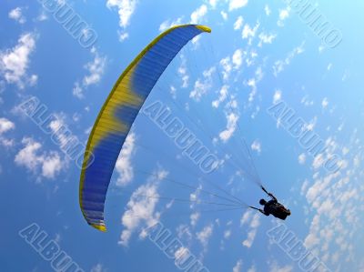 Paraglide on a blue sky