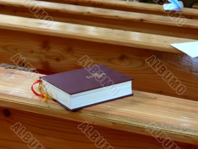 Bible on a pew