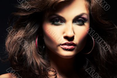 brunette girl posing in studio